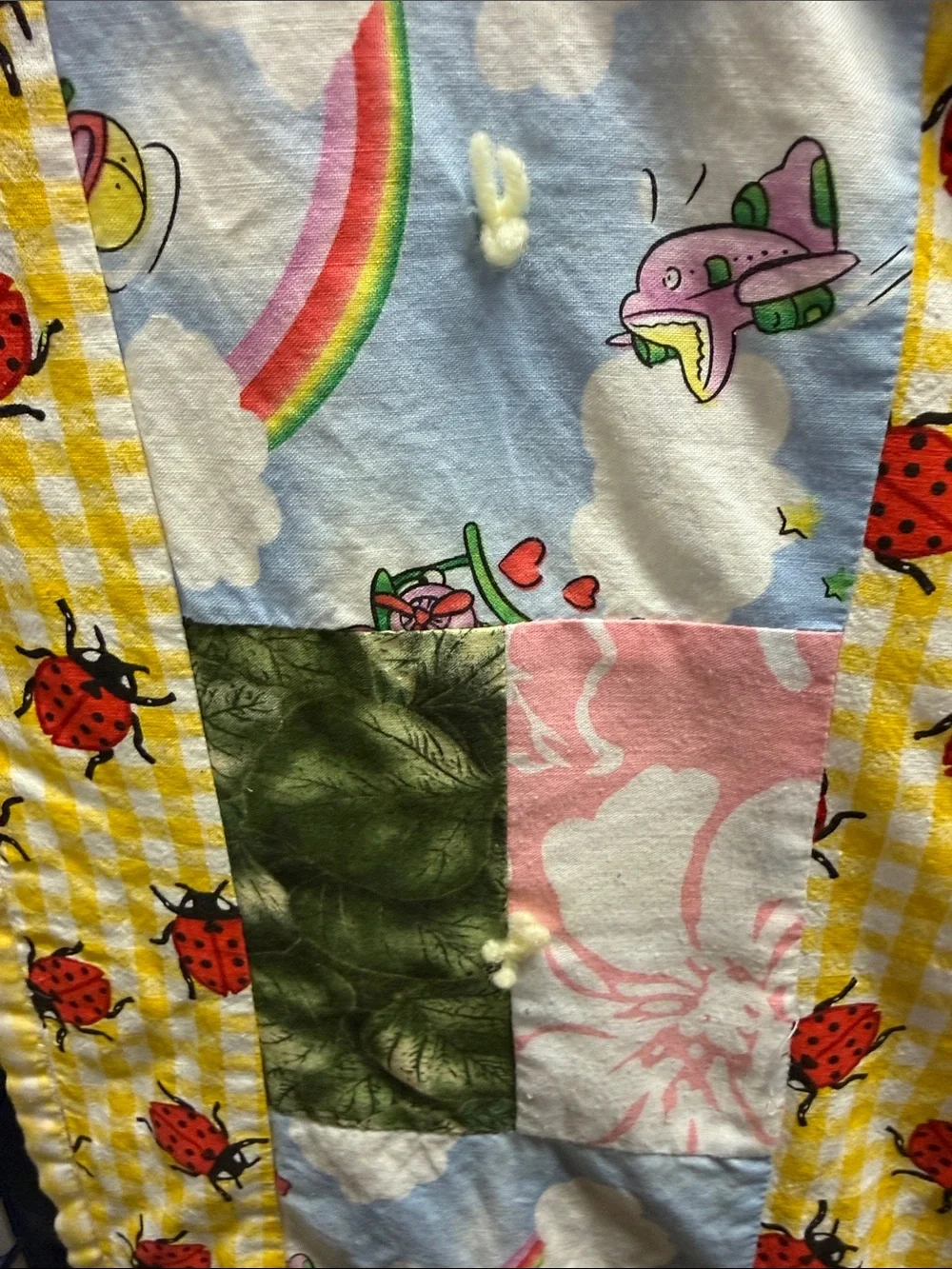 Colorful Ladybug Patchwork Quilt with Yellow Gingham Accents